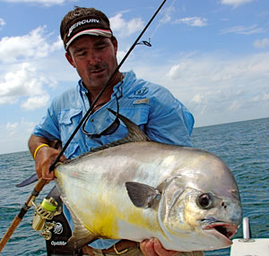 Capt. Will Geraghty holding a permit caught off a local wreck.